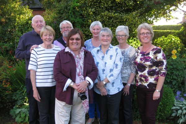 Left to right in the photograph: Billy McCone, Maeve Bell, Victor Henry, Yvonne Penpraze, Roz Henry, Lorna Goldstrom, Maureen Reid and Barbara Kelso.